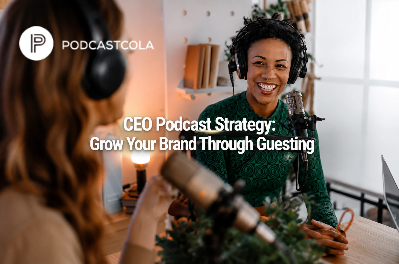 A smiling guest in a studio illustrating a successful CEO Podcast Strategy.